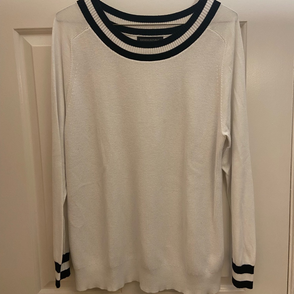 Banana Republic light sweater white color with dark blue color trim.